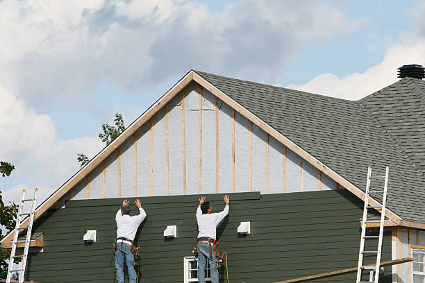 Professional Emergency Siding Repair technician working in Henderson, MD